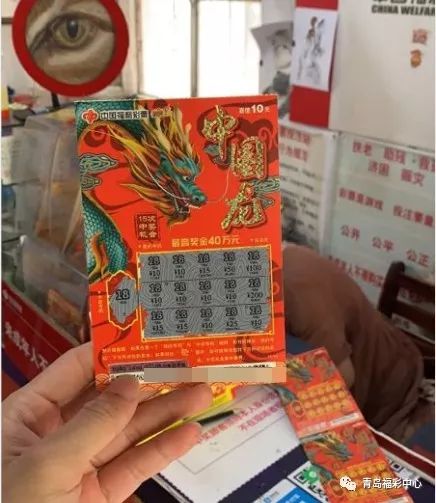 本来是希望买上几注双色球,但在站里彩民刮"中国龙"彩票的热情和活动"