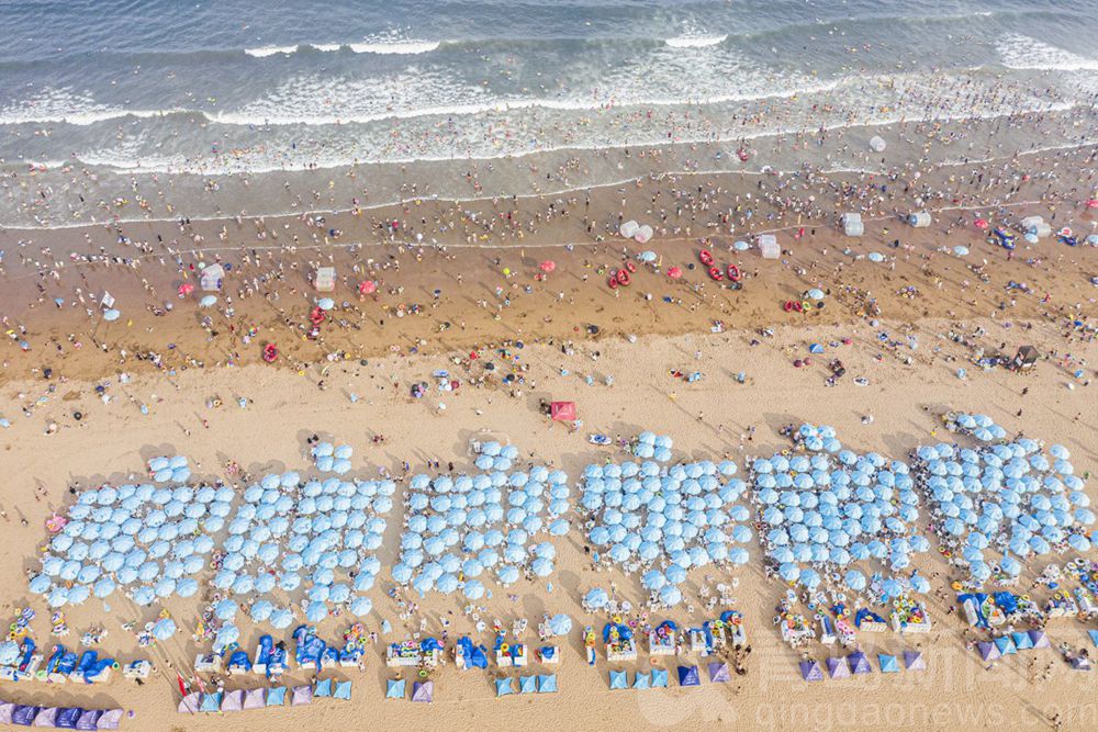 金沙滩海水浴场|金沙滩海水浴场 五颜六色数不清的游泳圈像不像甜甜圈